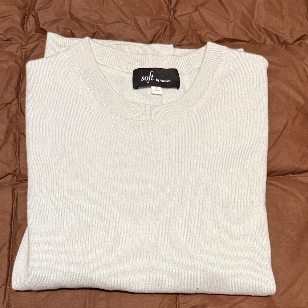 NAADAM 100% cashmere. Classic Crewneck Sweater in light blue.